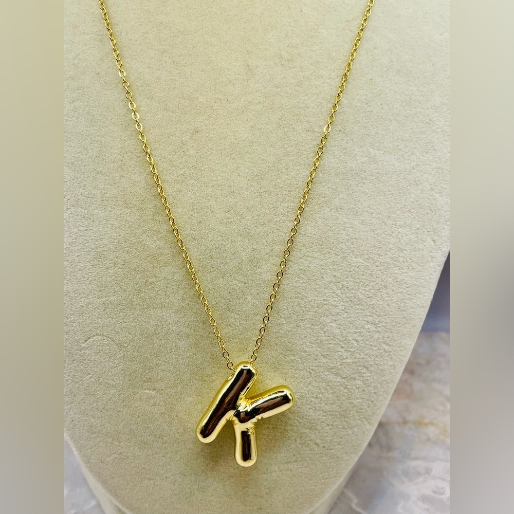 Gold Tone Initial “K” Pendant Necklace. 17 inches long with a 2 inch extender